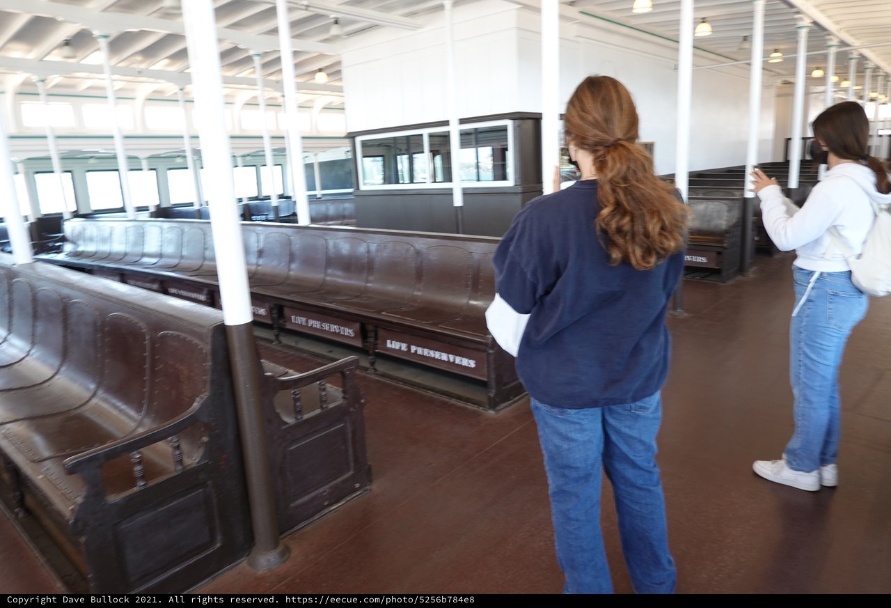 Museum Visitors Viewing Historic Train Car Display