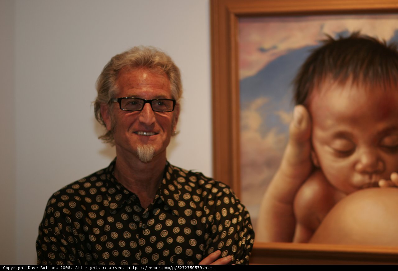 Man Contemplating Artwork