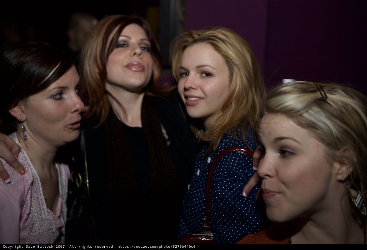 Four Women Socializing at Nightclub Event 2007