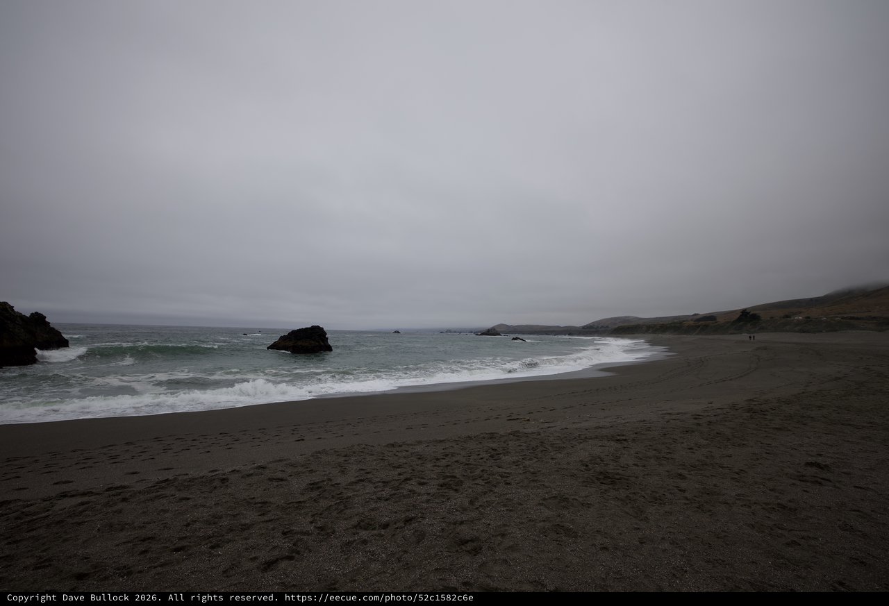 Moody Gray Skies Over Rugged California Coastal Beach
