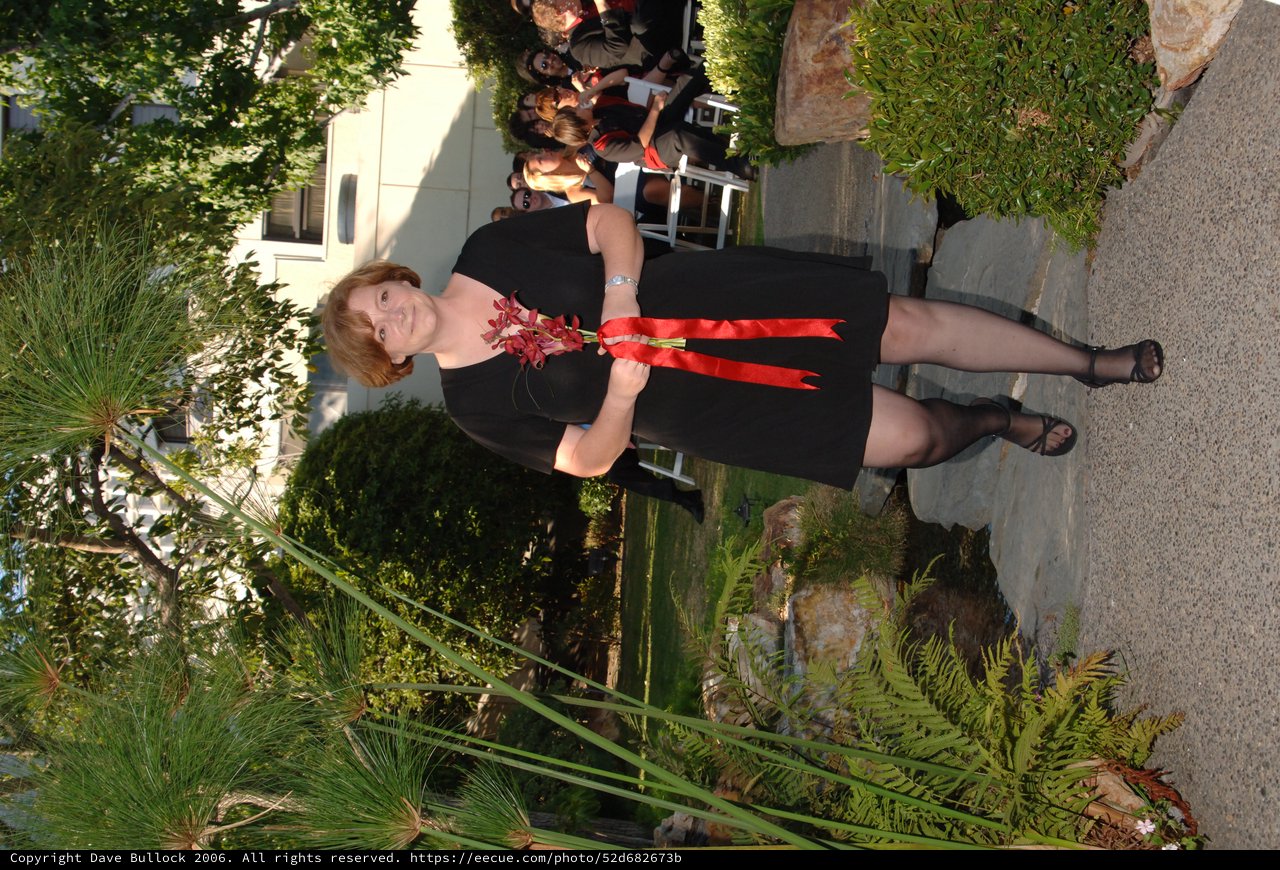 Bridesmaid Walking Down Garden Wedding Aisle