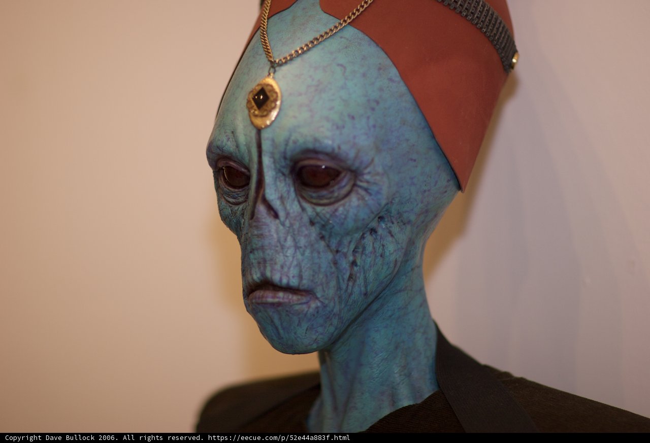 Blue Alien with a Red Hat