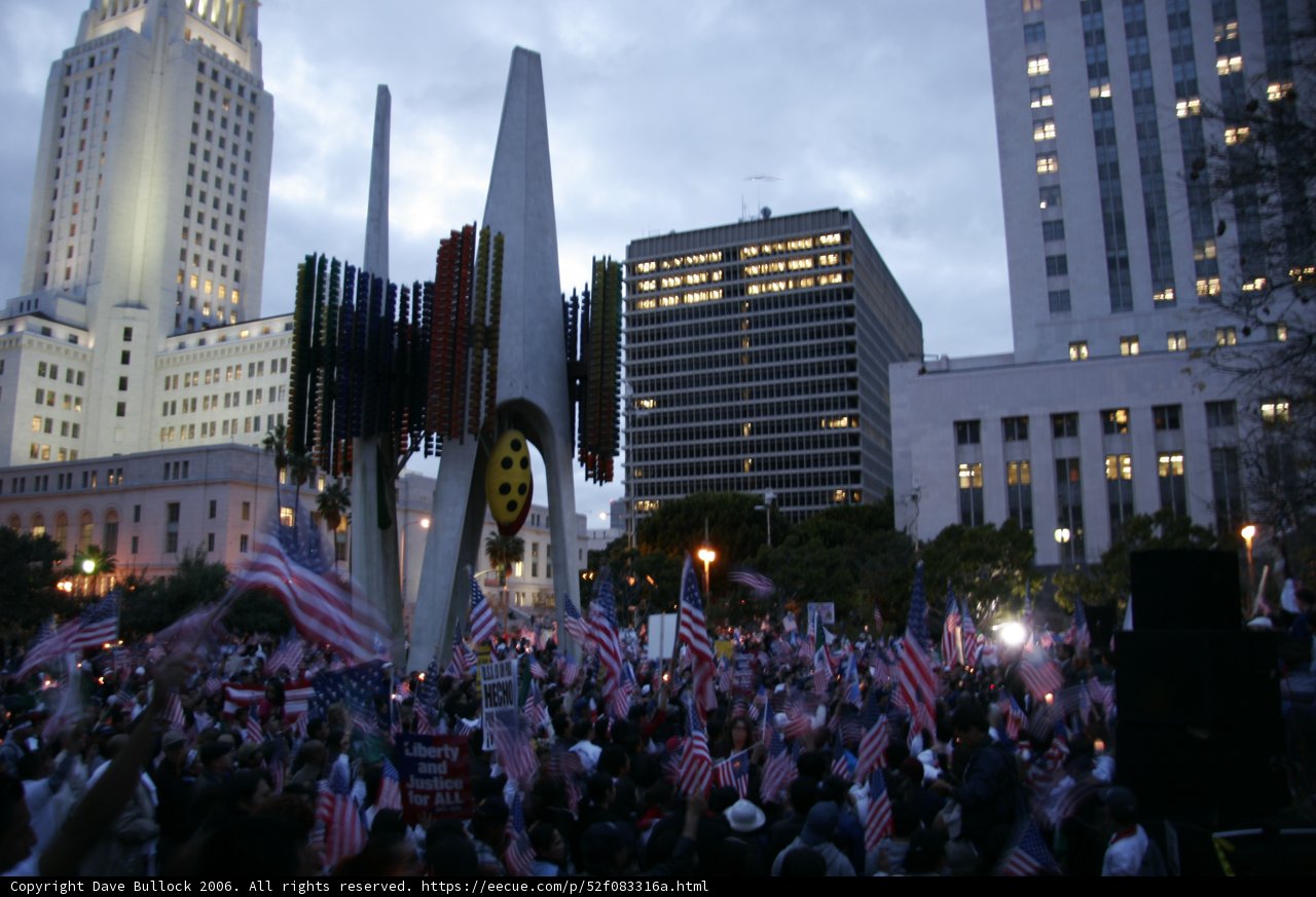 Patriotic Crowd at City Building