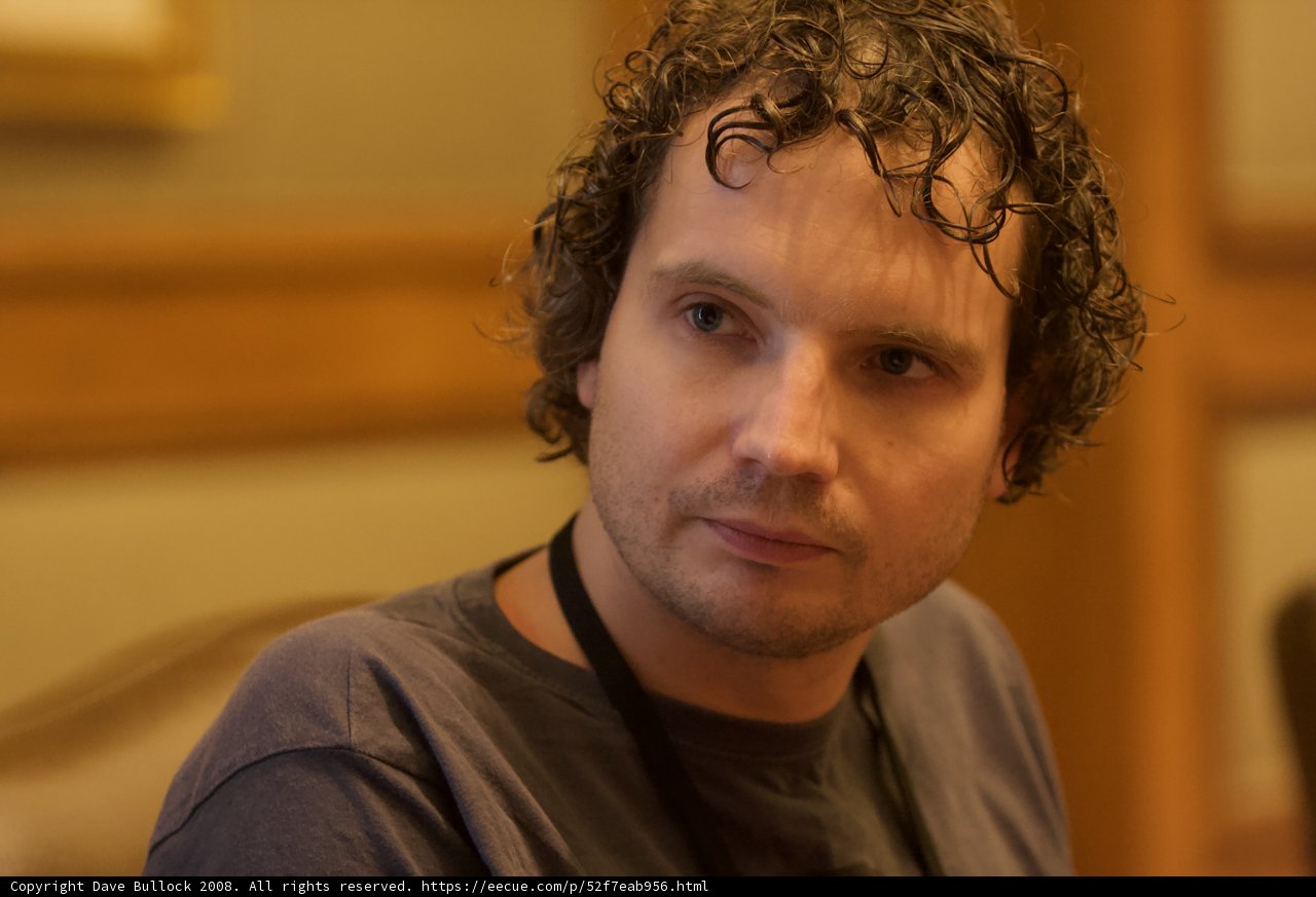 Curly Haired Gentleman Relaxing