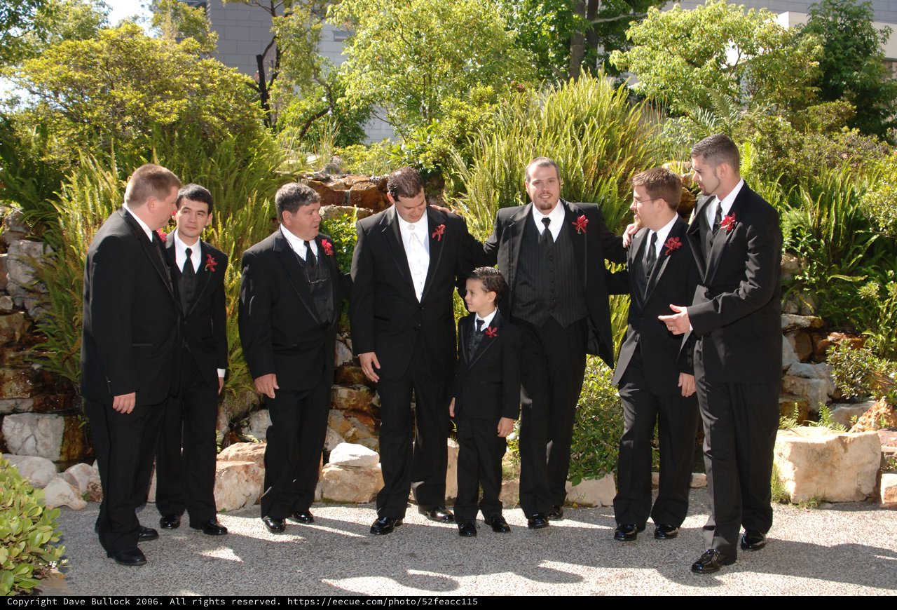 Groomsmen Share a Moment Before the Wedding Ceremony