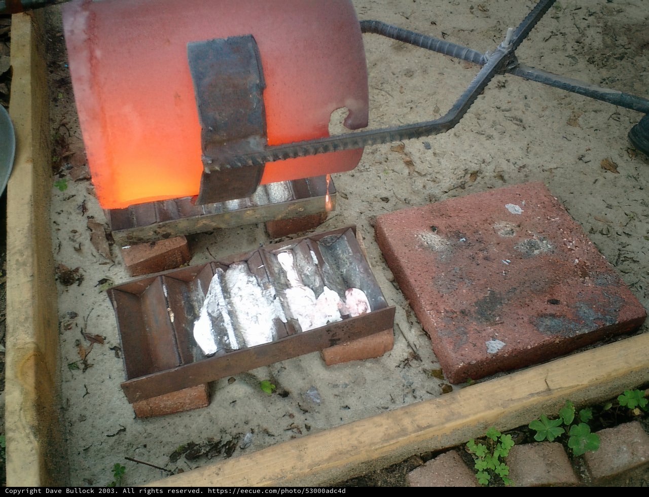 Metal forging on a brick