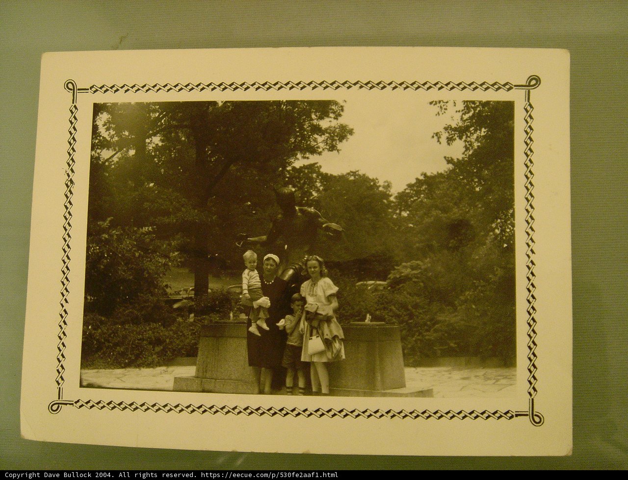 Family Portrait in Front of Statue