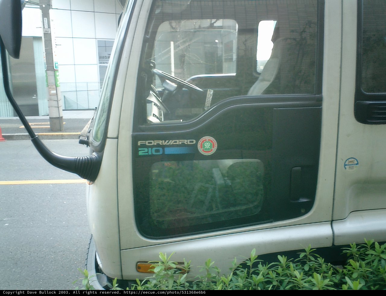 Parked Bus amidst Tokyo Metropolis