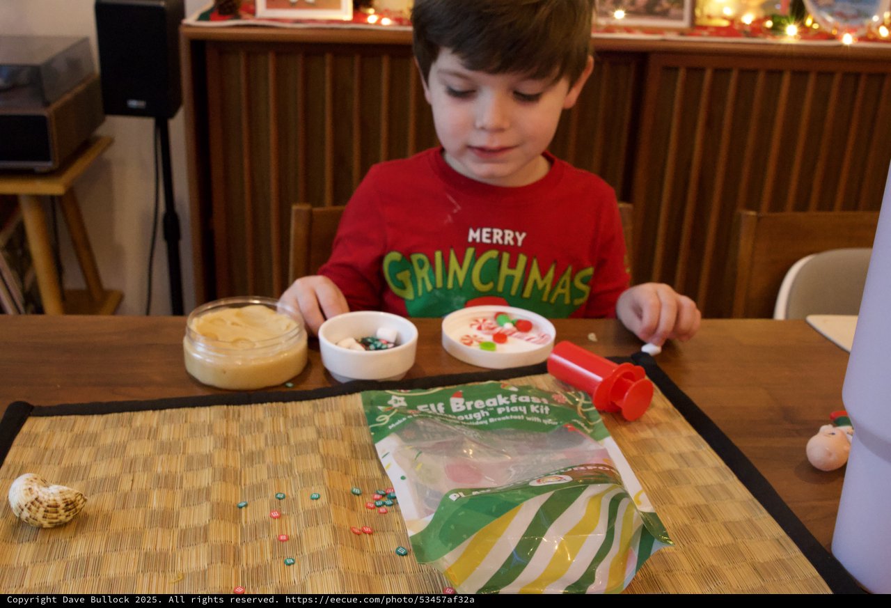Child Crafting Christmas Ornaments with Dough Play Kit
