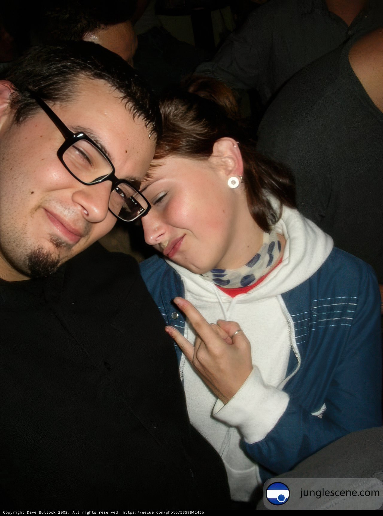 Portrait of Dave B and a Woman in Eyeglasses