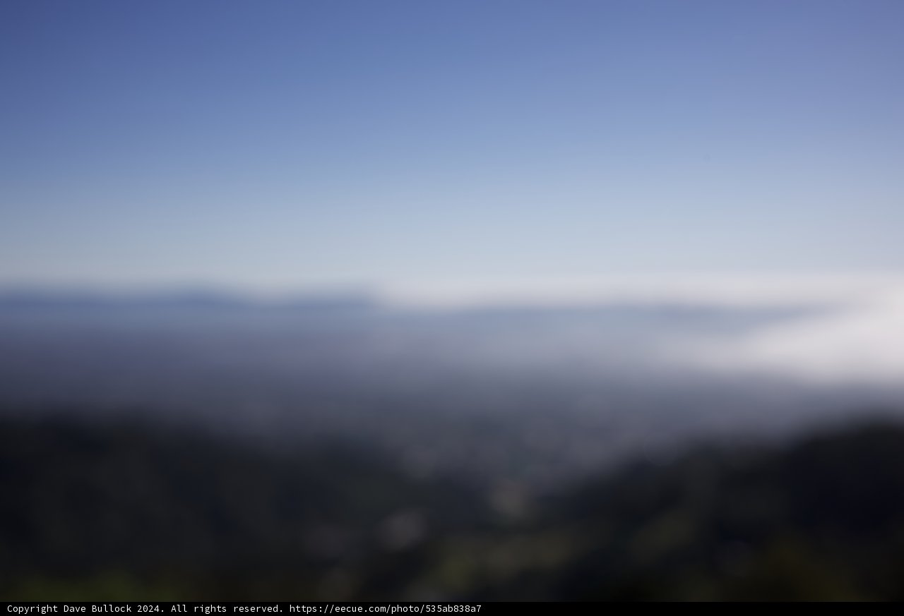 Misty Horizons: An Abstract Mountain View