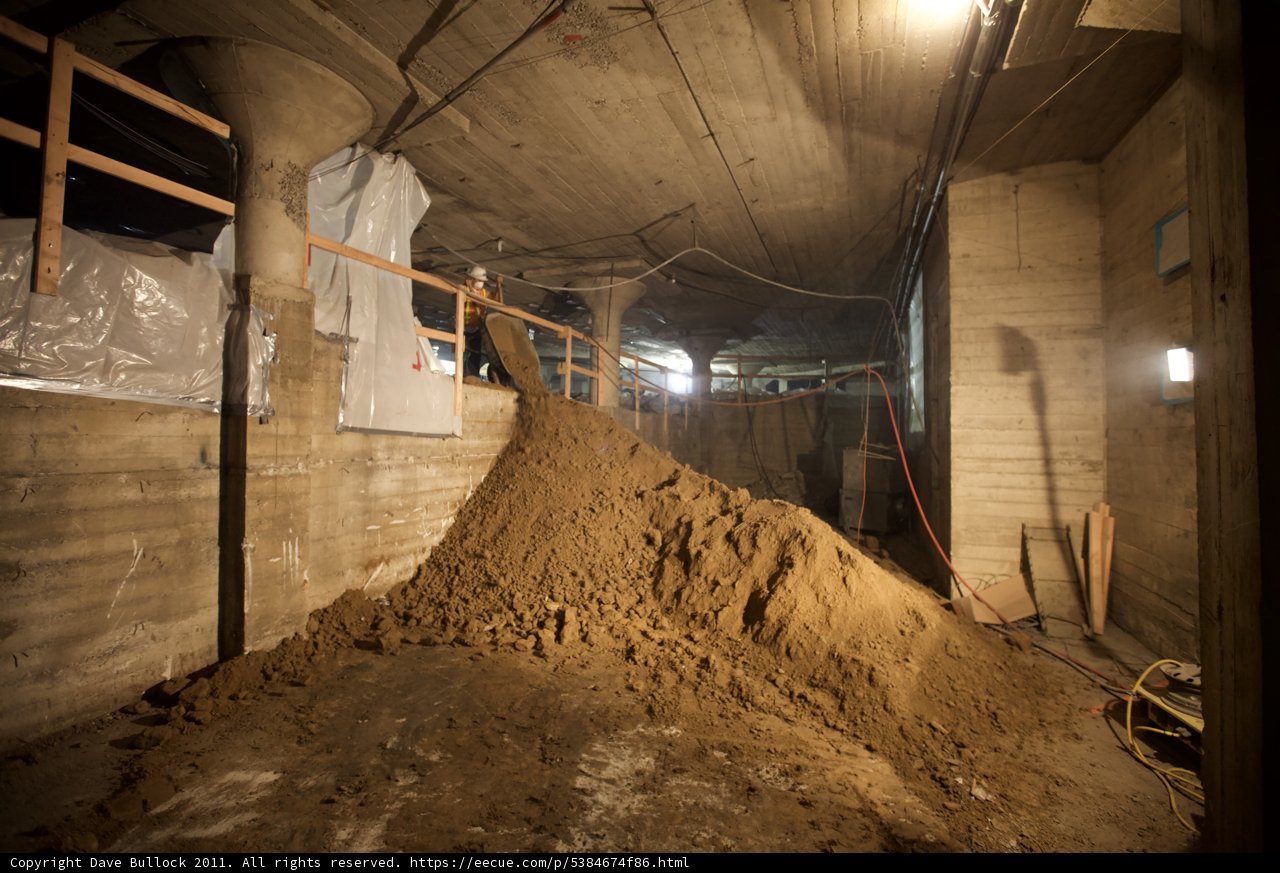 Sand Pile and Ladder in Basement Room