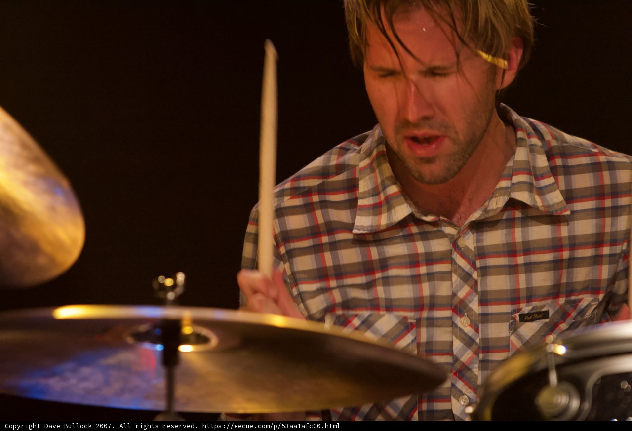 Brooks Wackerman rocking the stage with his drums
