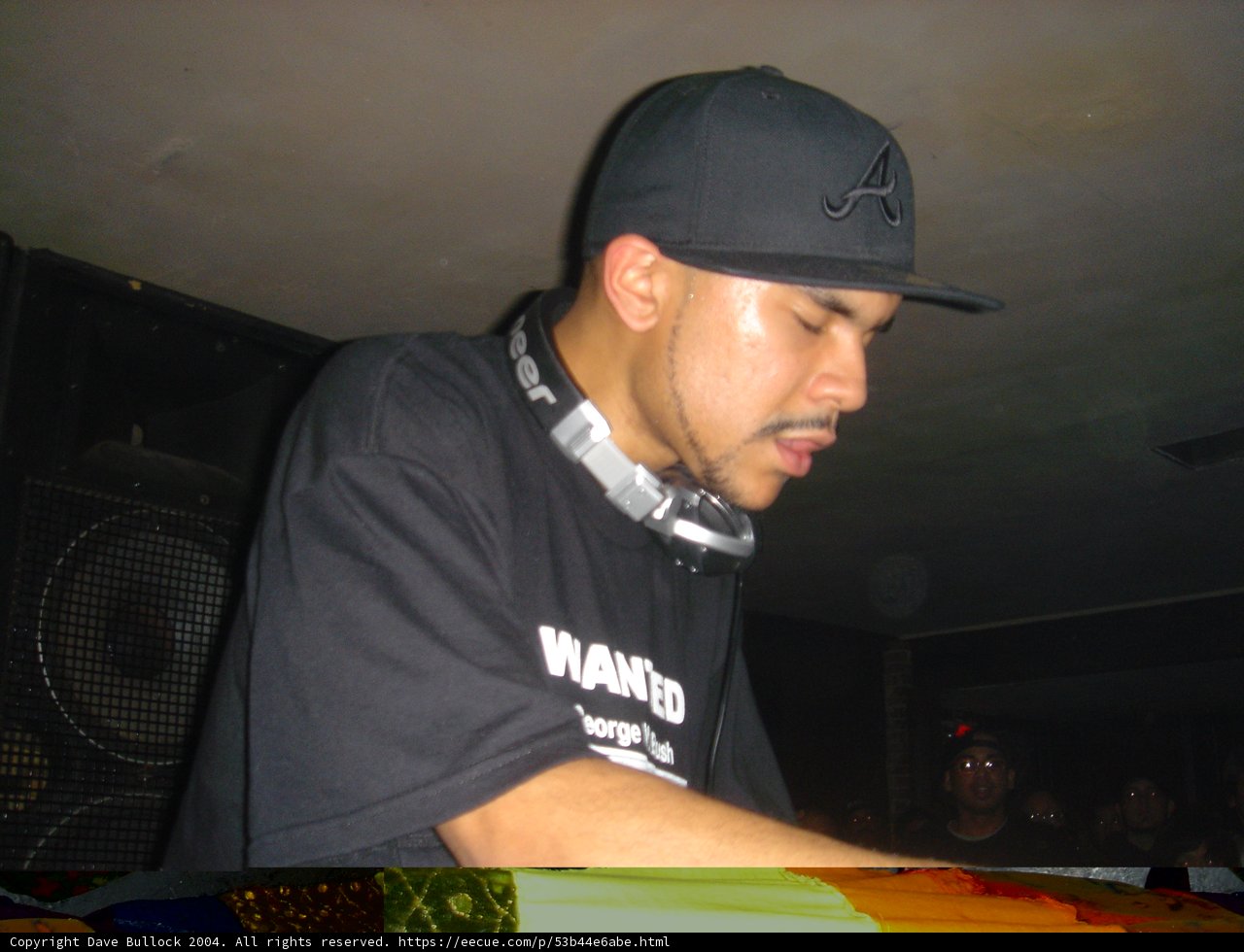 Black-shirted Craze with Baseball Cap and Headphones