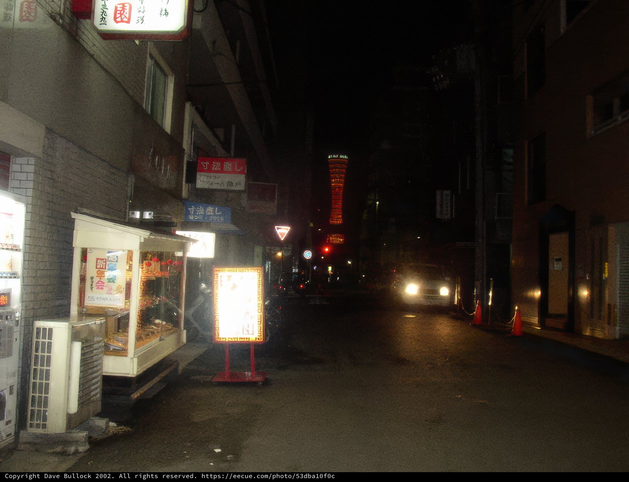 Nighttime Scene of a Busy City Street