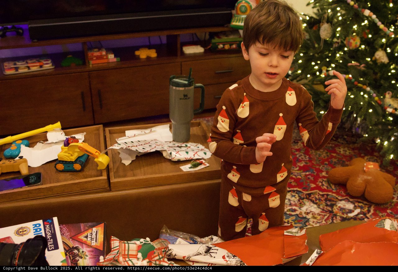Christmas Morning Gift Opening in Festive Pajamas