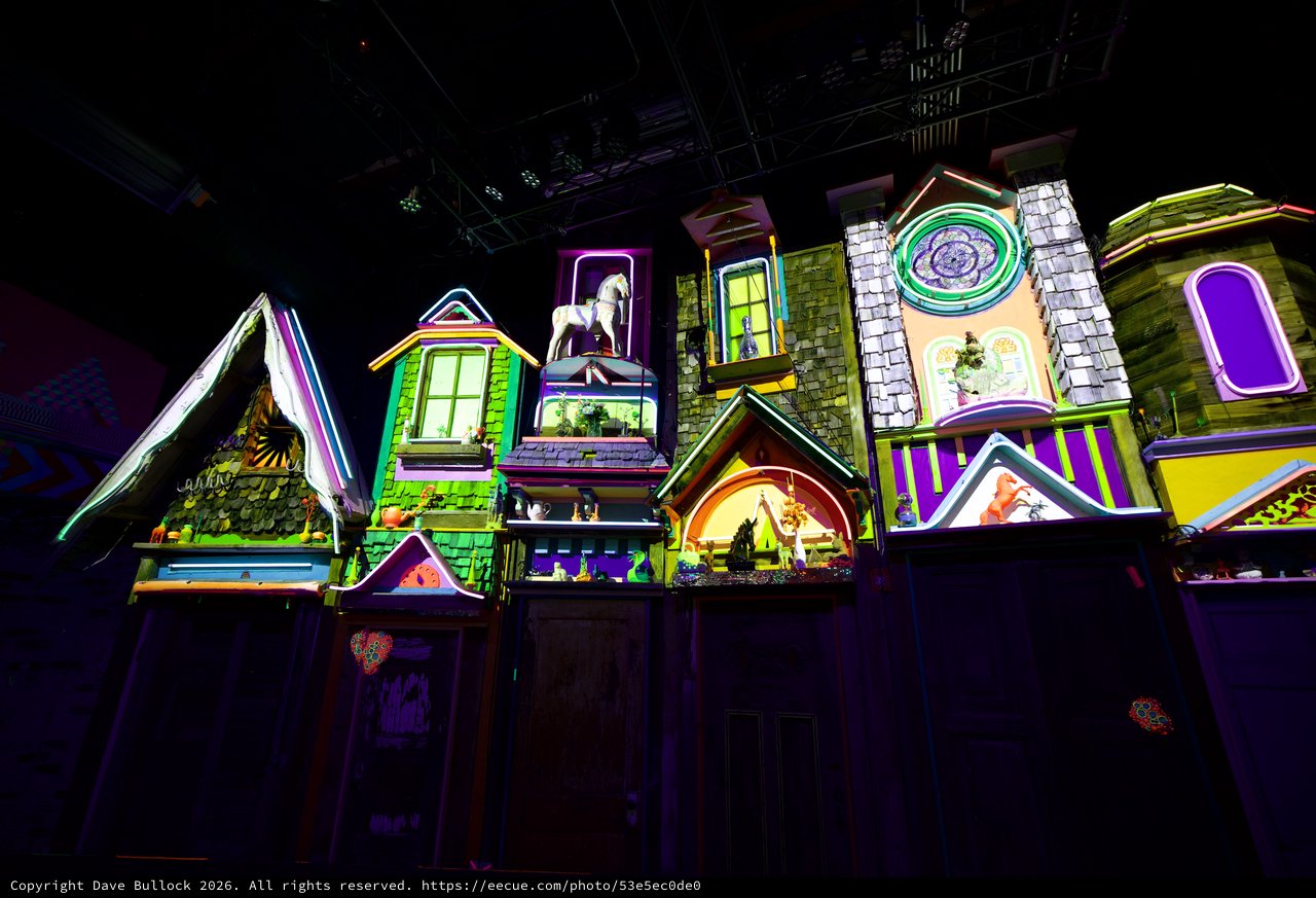 Whimsical Illuminated Village Display with Neon Colors