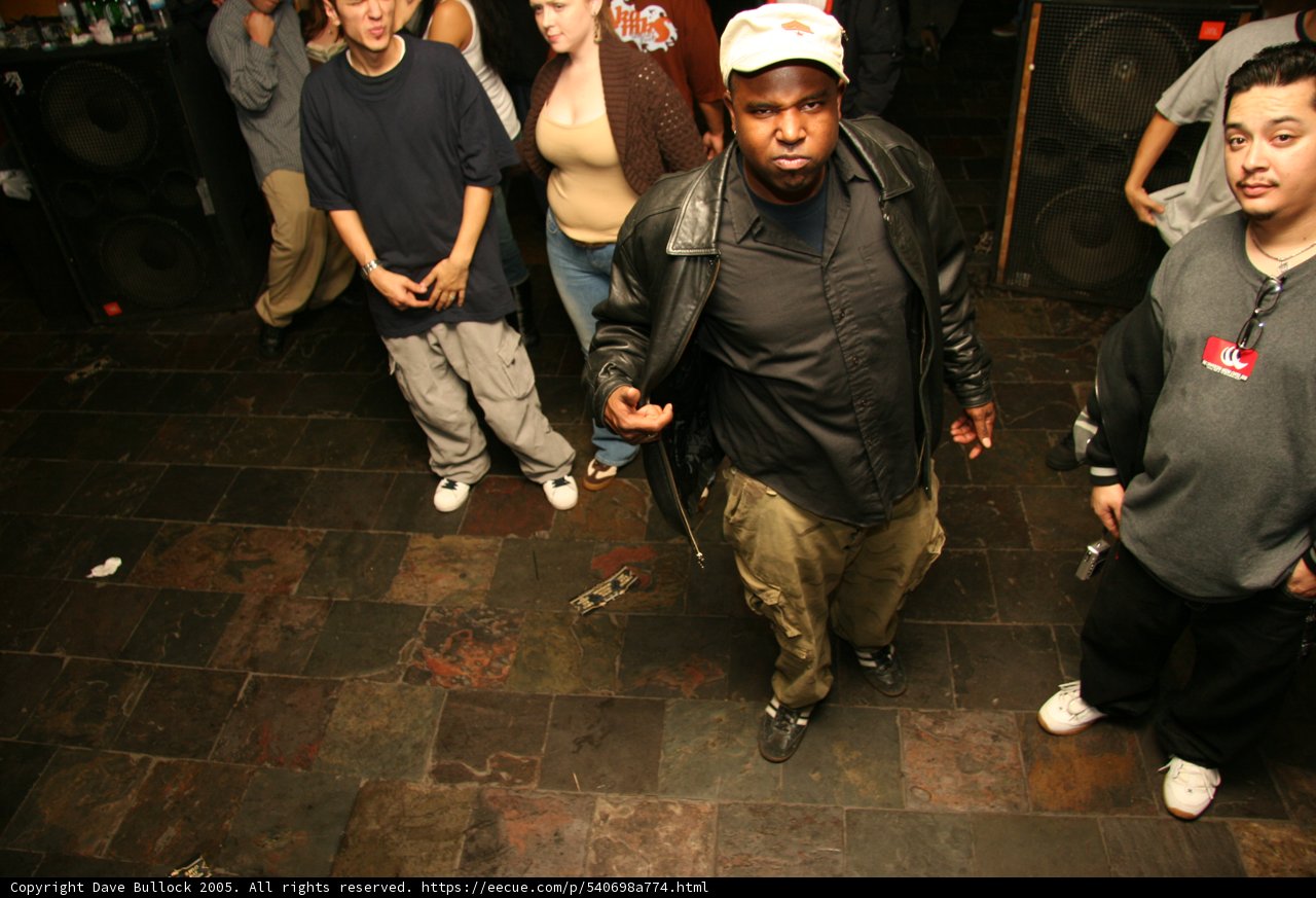 Man in Black Jacket and Baseball Cap
