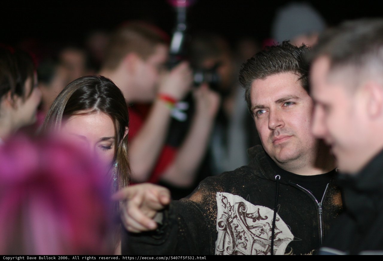 Pink-haired Man in Black Jacket at Nightclub