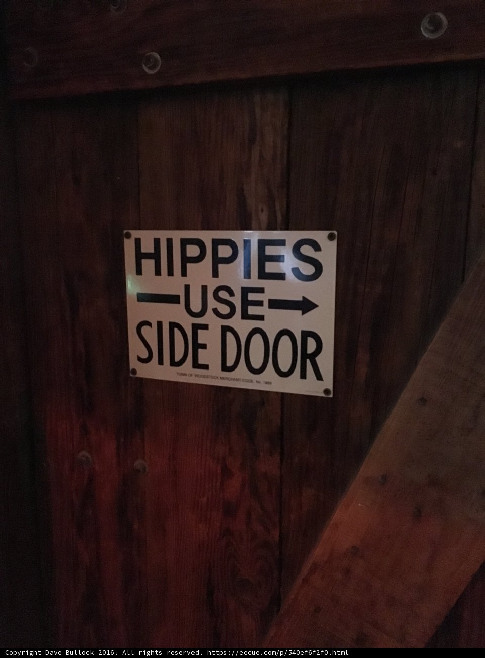 Hippies Know the Way: Wooden Sign Leads the Path