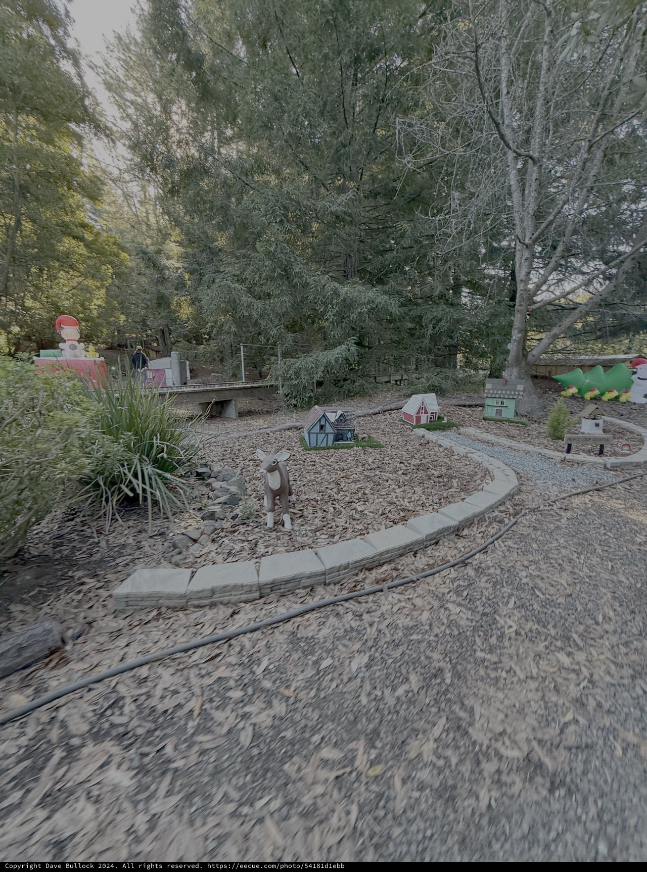 Miniature Village Display in Garden Setting