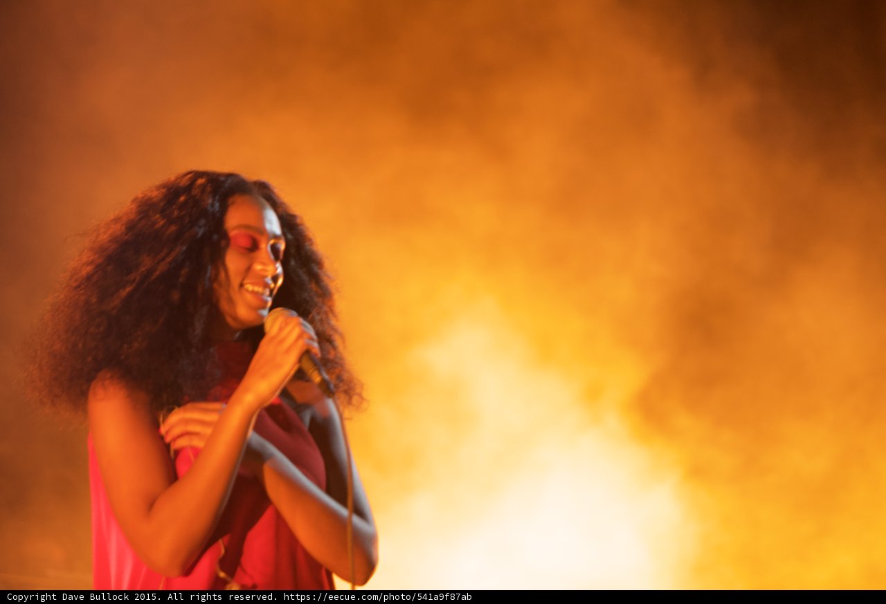 Solange Portrait Smiling Serene Golden Orange Light