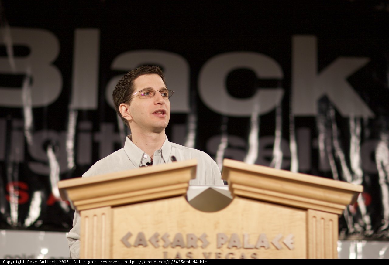 Jeff M delivering a speech at a podium