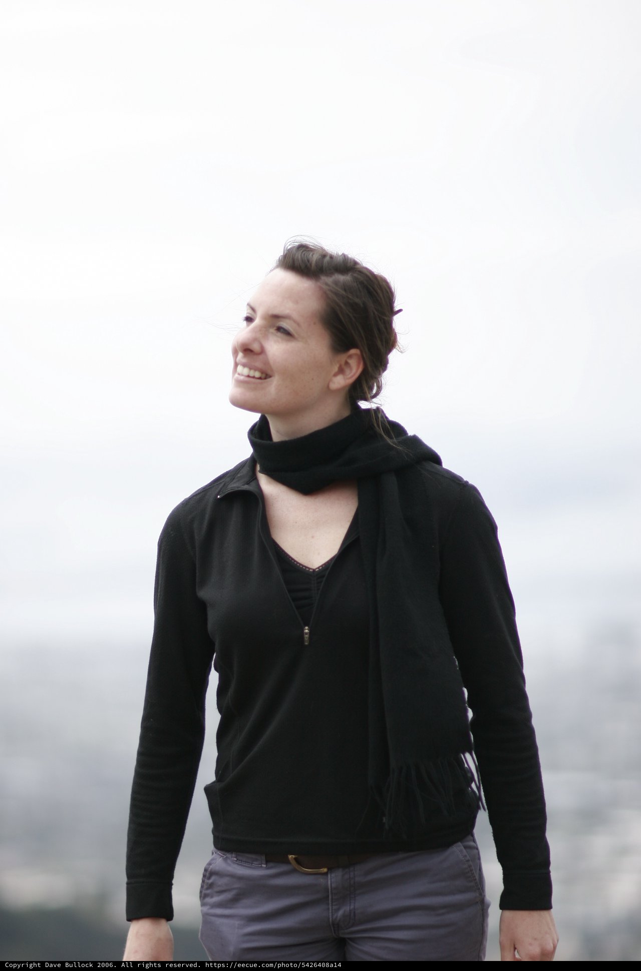 Woman Smiling Skyward on San Francisco Overlook
