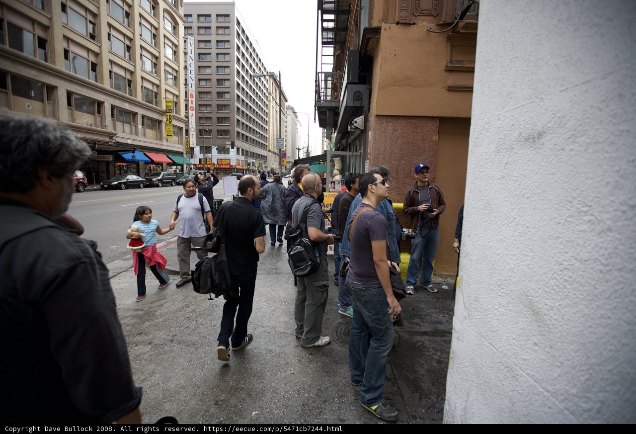 Urban Crowd on Sidewalk