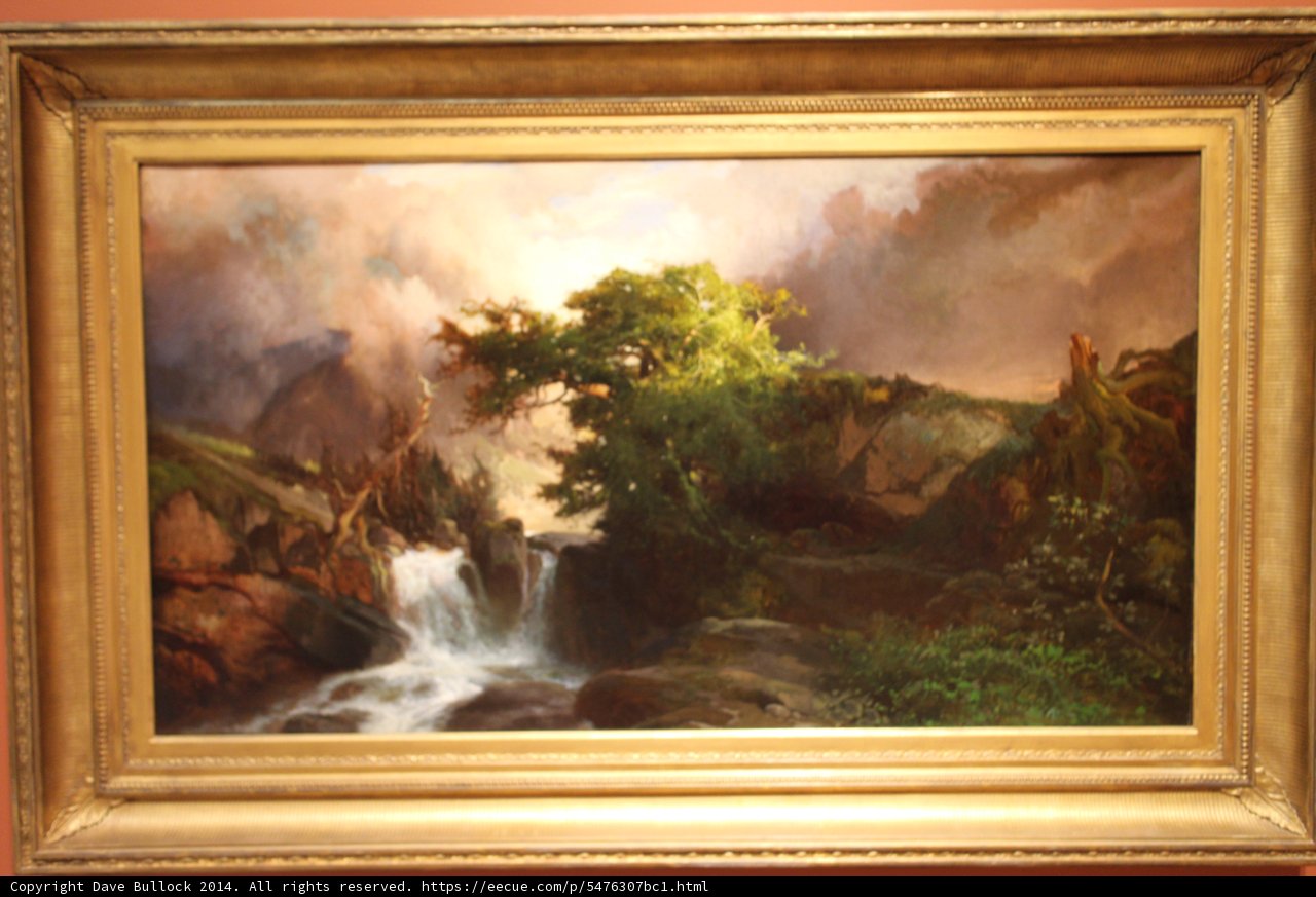 The Majestic Waterfall in the Mountain Landscape