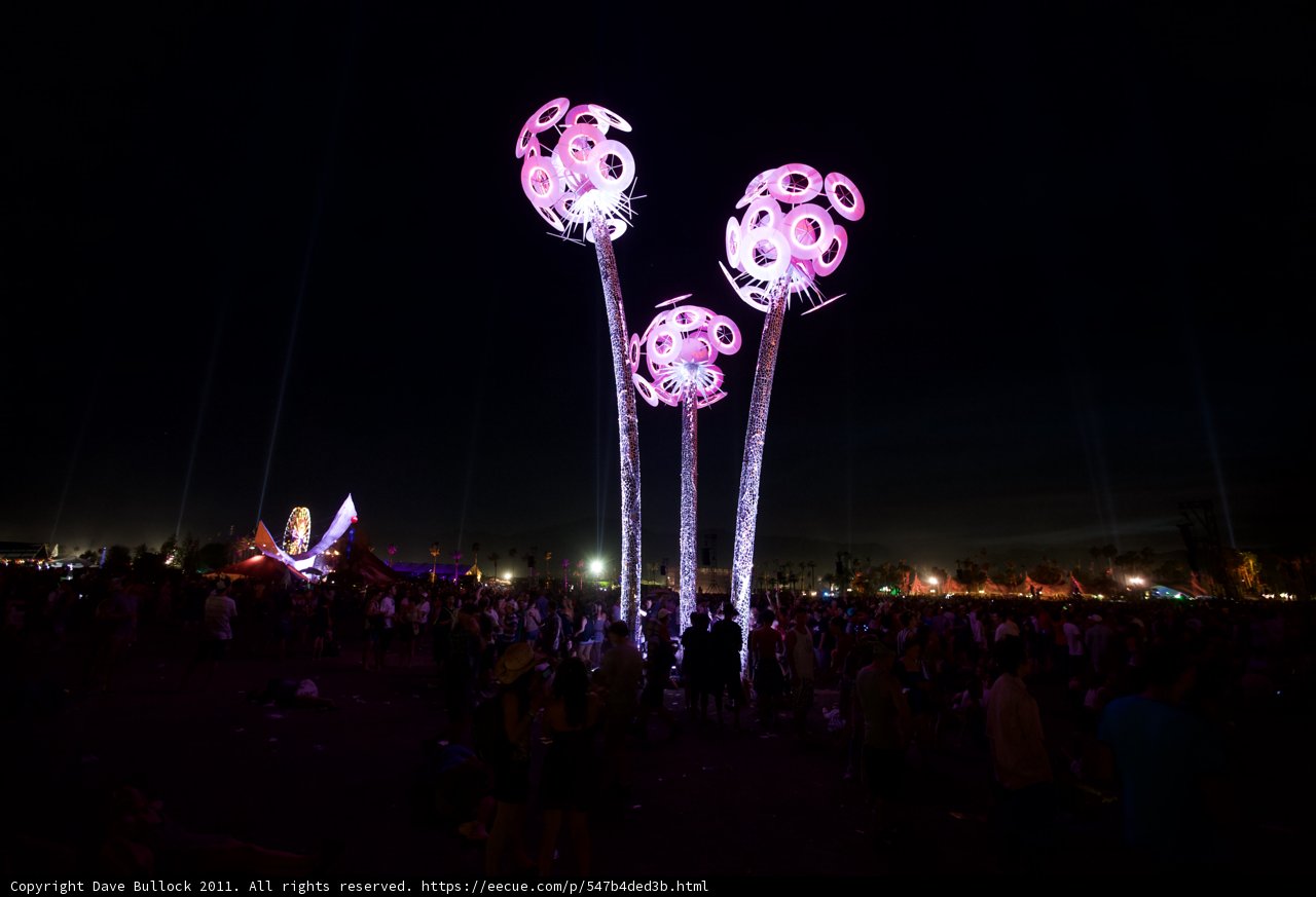 Illuminated Sculpture Attracts Nighttime Crowd