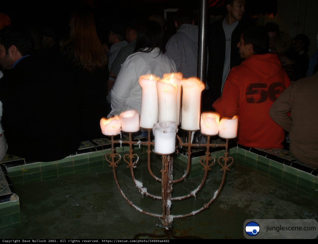 Lighting the Hanukkah Menorah in the Pool