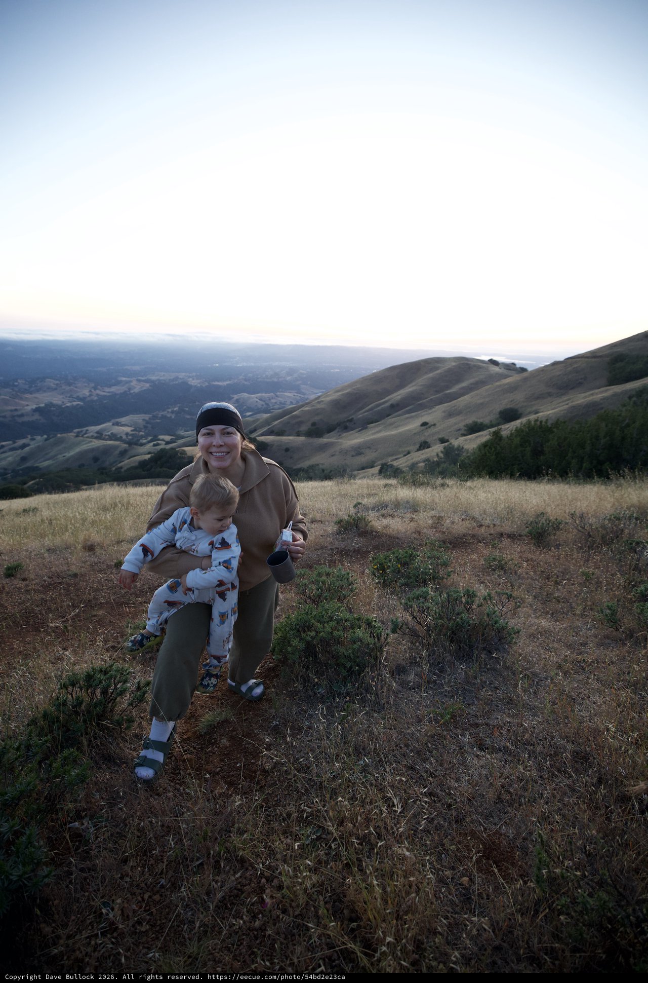 Mother and Toddler Hiking Golden Hills at Dusk