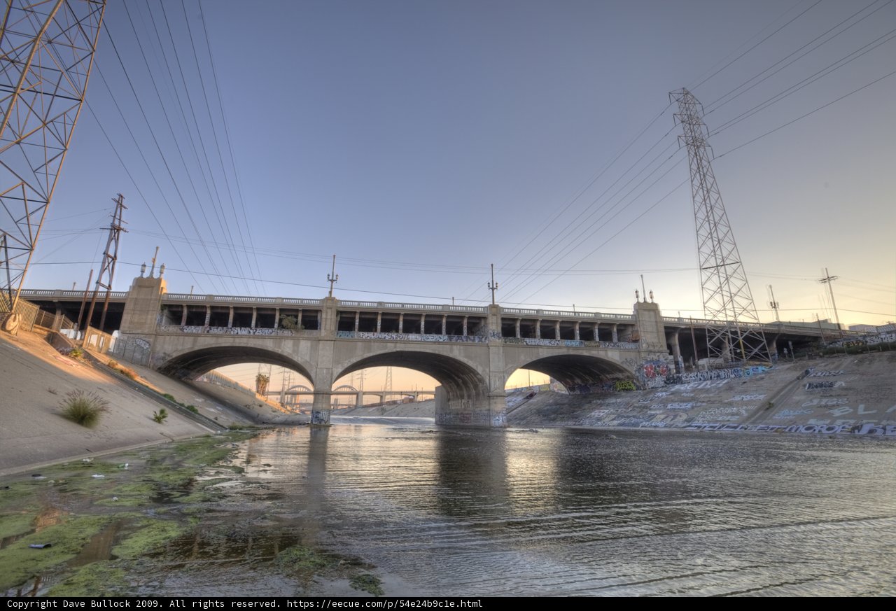 River Bridge With Power Line in the Background