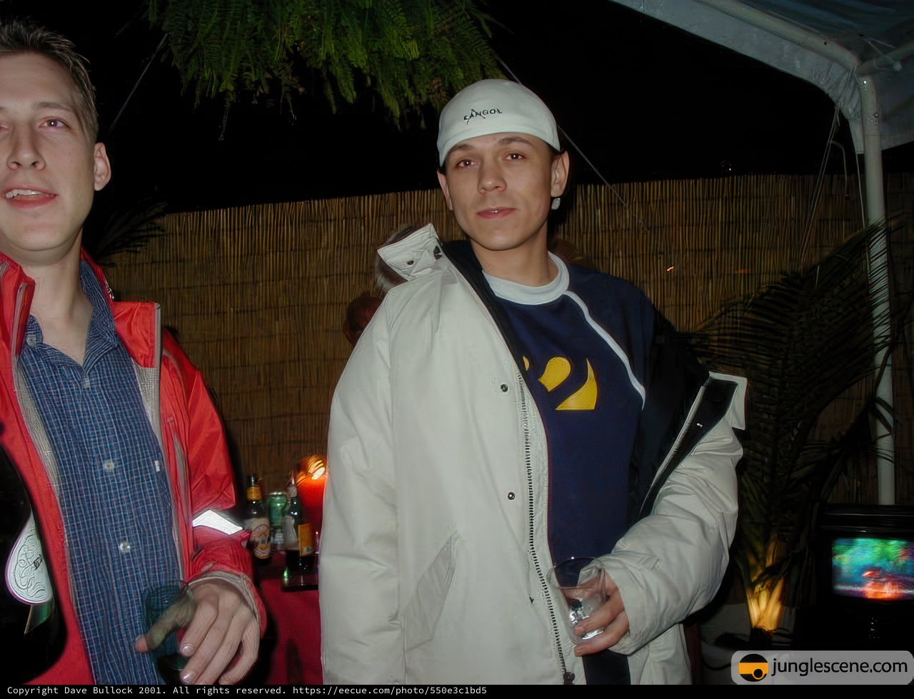 Two Men Posed for a New Year Group Picture