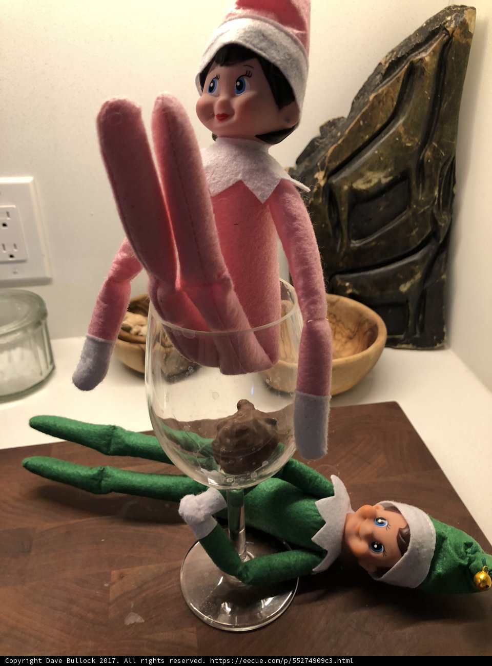 Elf on the Shelf Sips on Some Wine