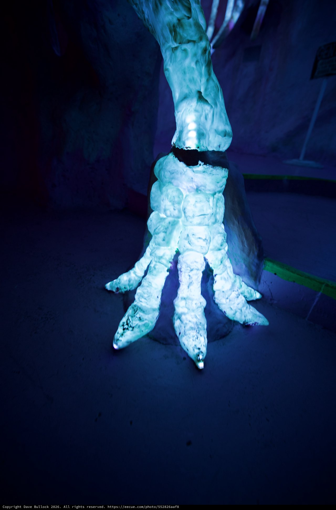 Taloned Ice Sculpture Under Blue Ethereal Lighting