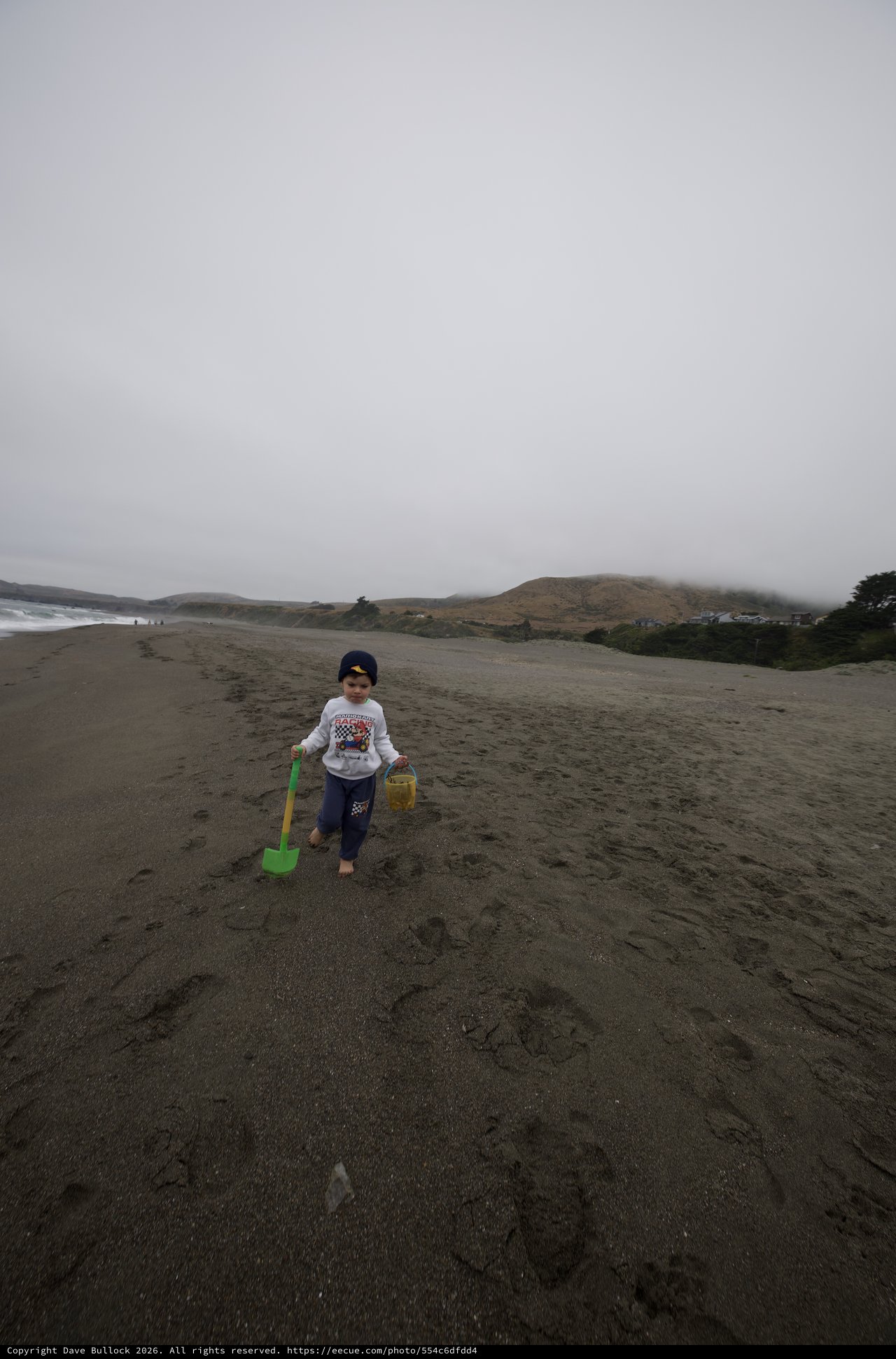 Young Explorer Walks Foggy Northern California Beach