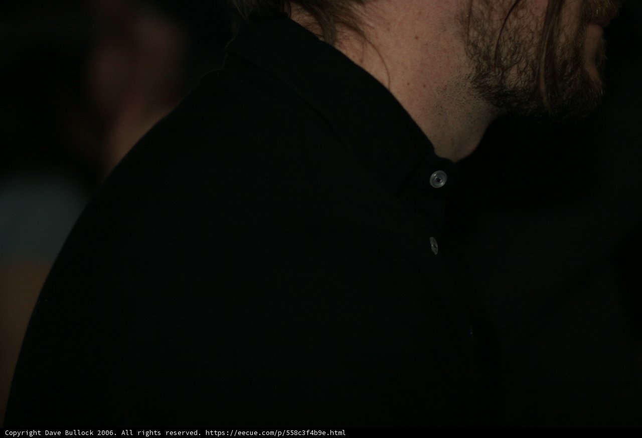 Respectful Man in Black Shirt and Beard