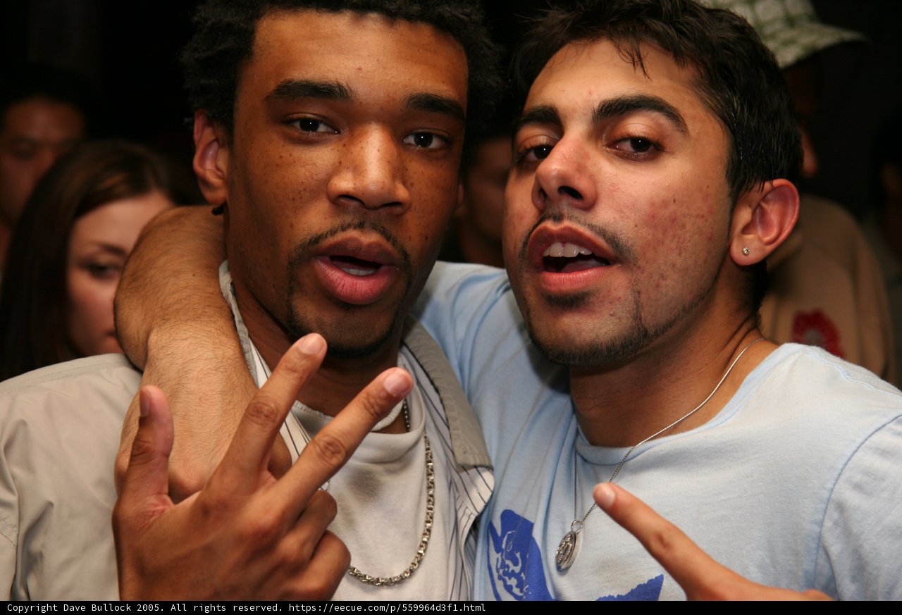 Two Men Strike a Pose