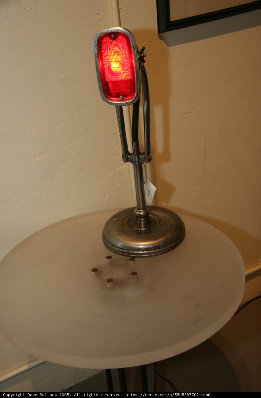 The Red Lamp on the Wooden Table