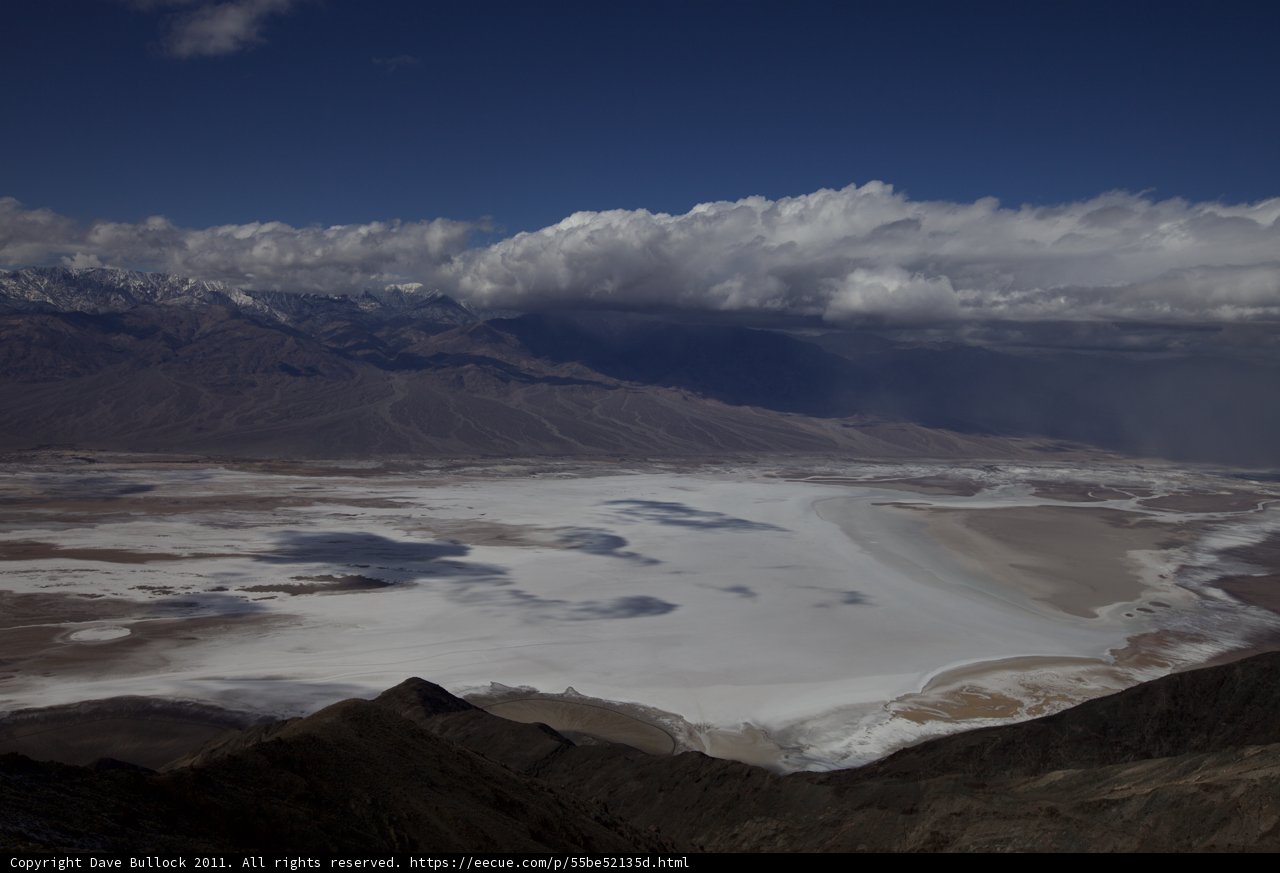 From Above: A Breathtaking View of the Mountains and Lake