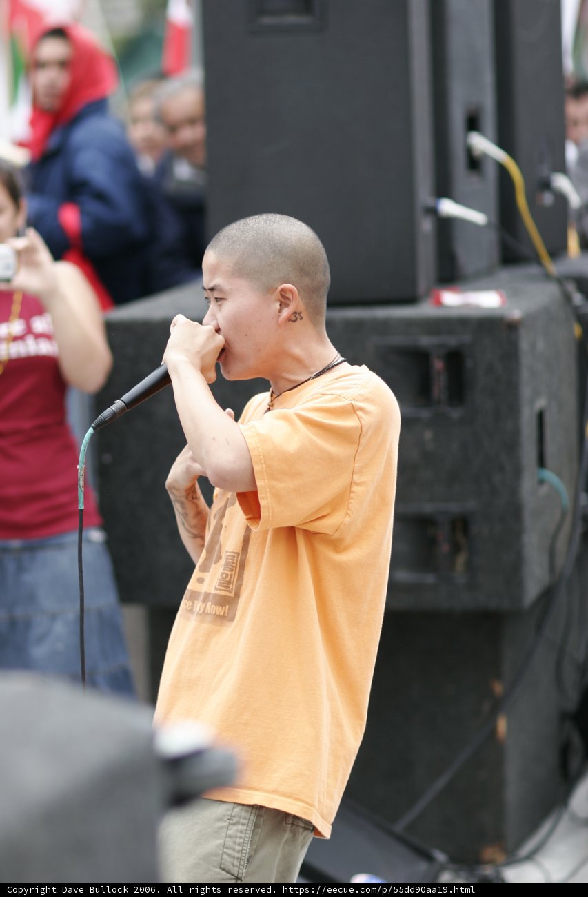 Orange-Clad Singer Wows Crowd at 2006 Student Protest