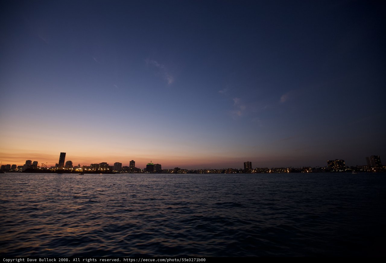 City Lights through Sunset Skies