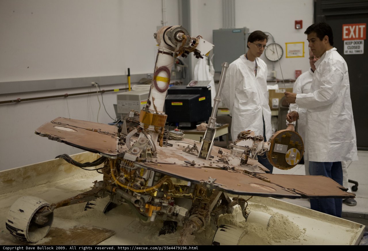 Two Men in White Coats at JPL Factory