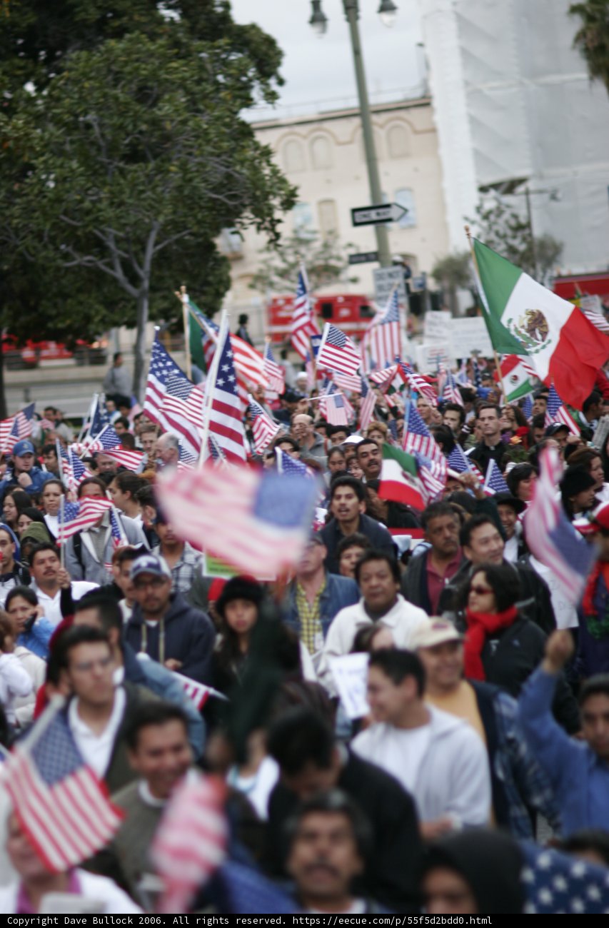 American and Mexican flags unite a diverse crowd