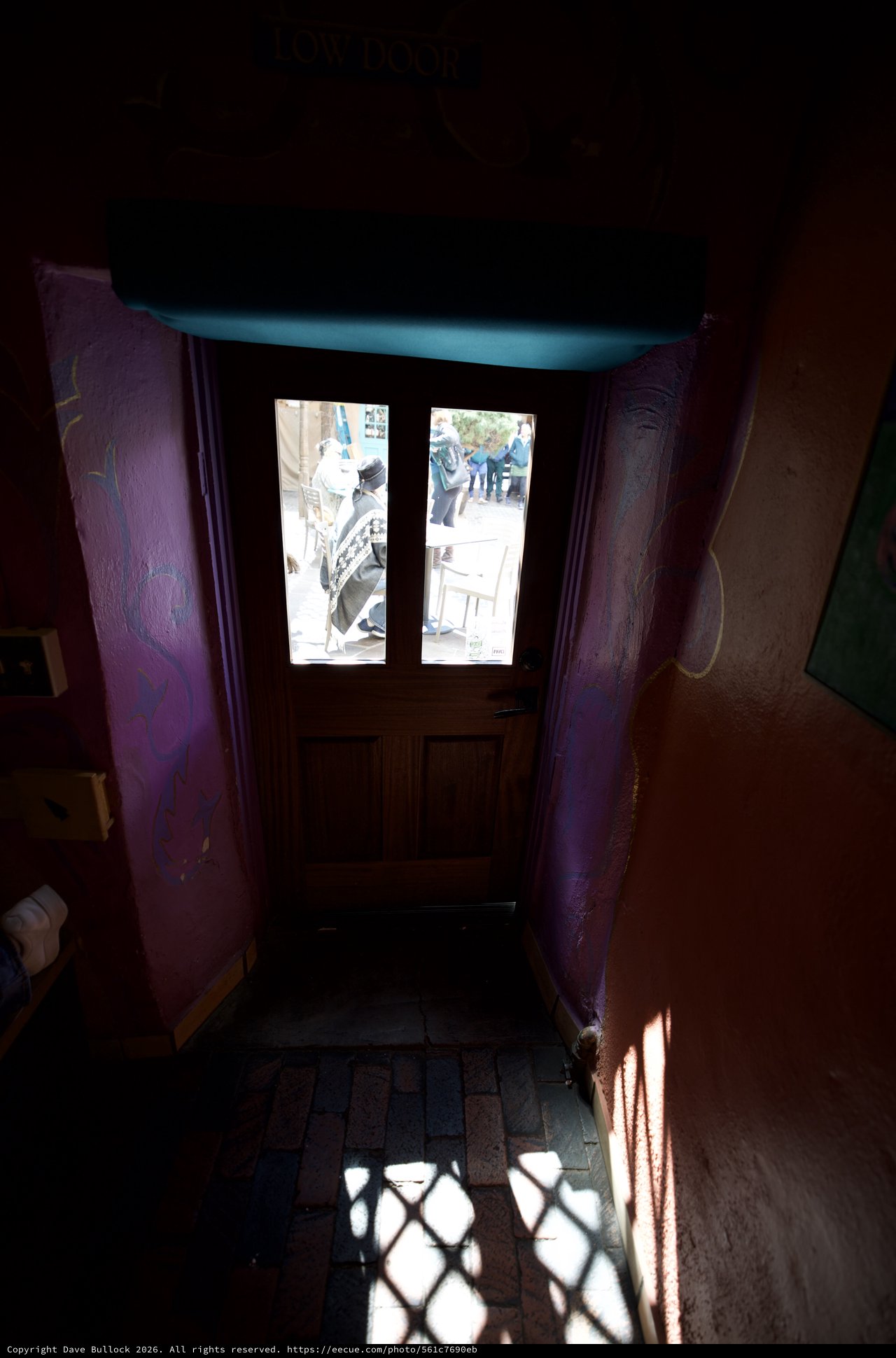 Vibrant Purple Entryway with Turquoise Ceiling in Santa Fe