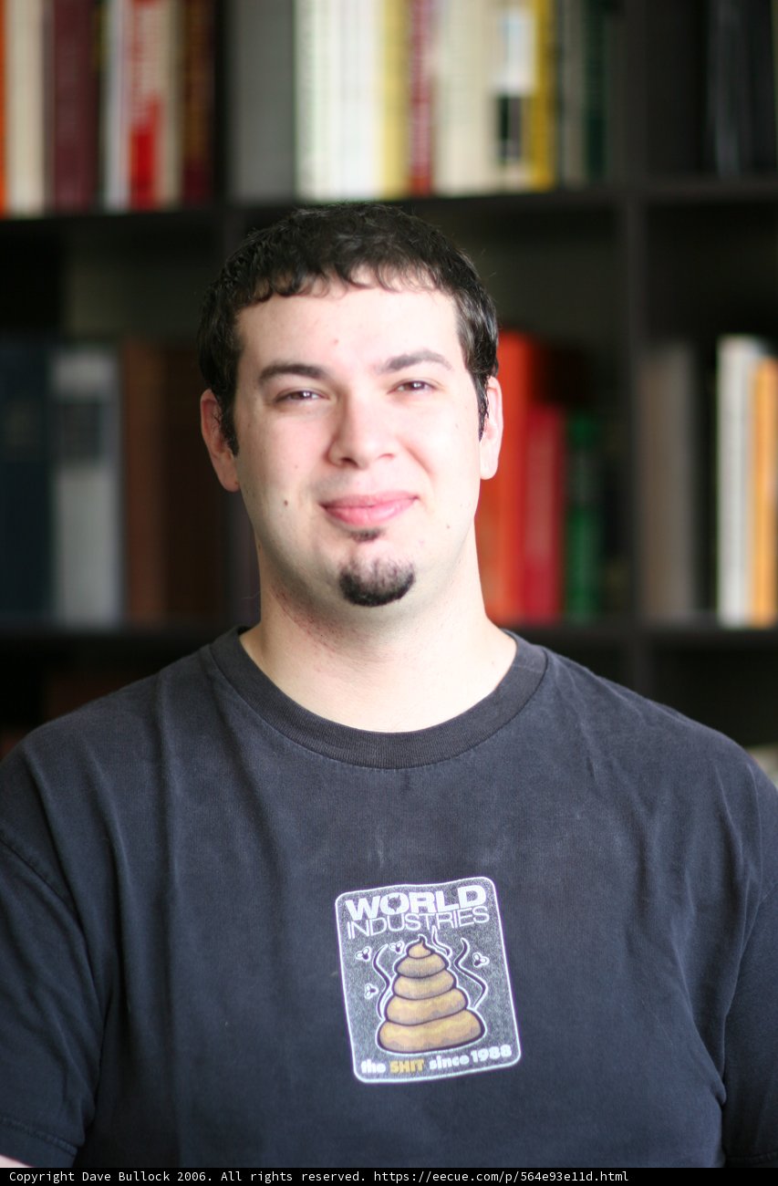 Smiling Man with Books