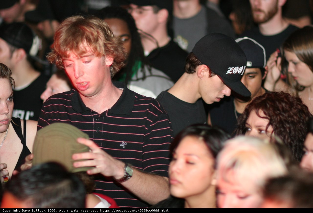 Partygoer in a Sea of Hats