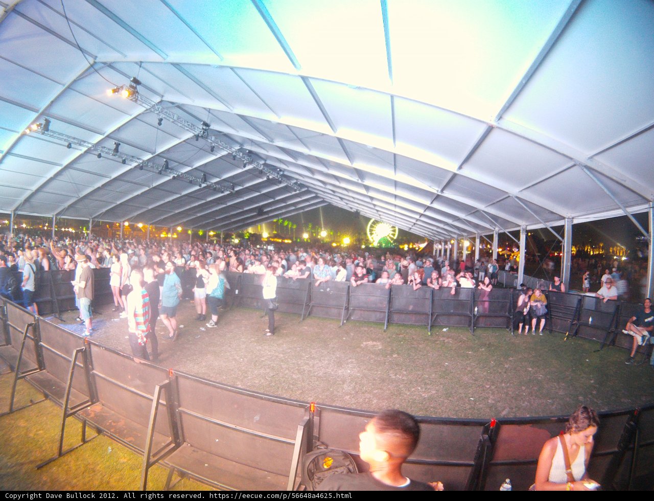 Concert Crowd in Outdoor Tent Venue